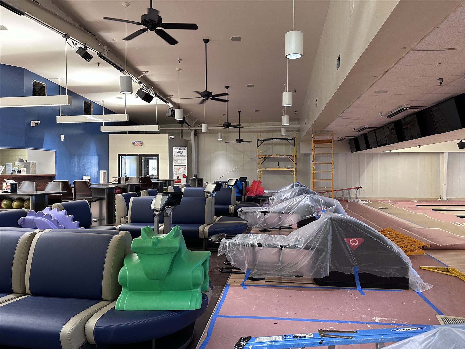 Commercial interior painting with protected floors and fixtures in DFW