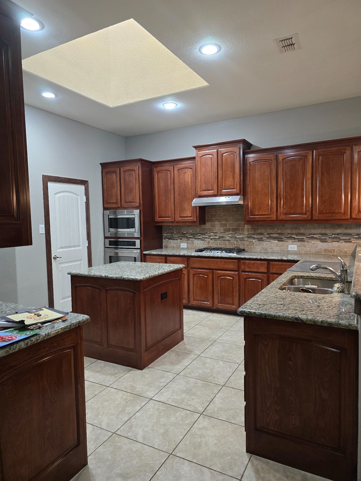 Finished kitchen cabinets and remodeling work by GMP Drywall LLC